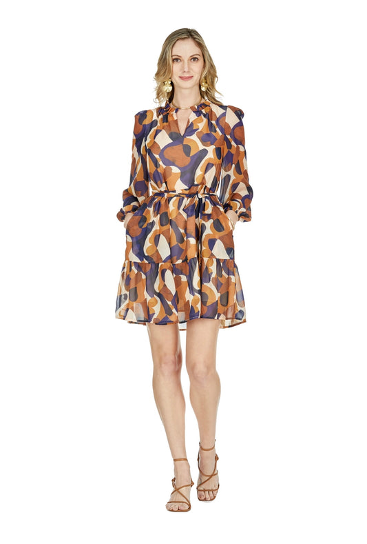 playful and chic dress in blue and browns, adorned with a fun but subtle pattern. Ideal for any autumn affair, with long sheer balloon sleeves. A classic and effortlessly cool look.